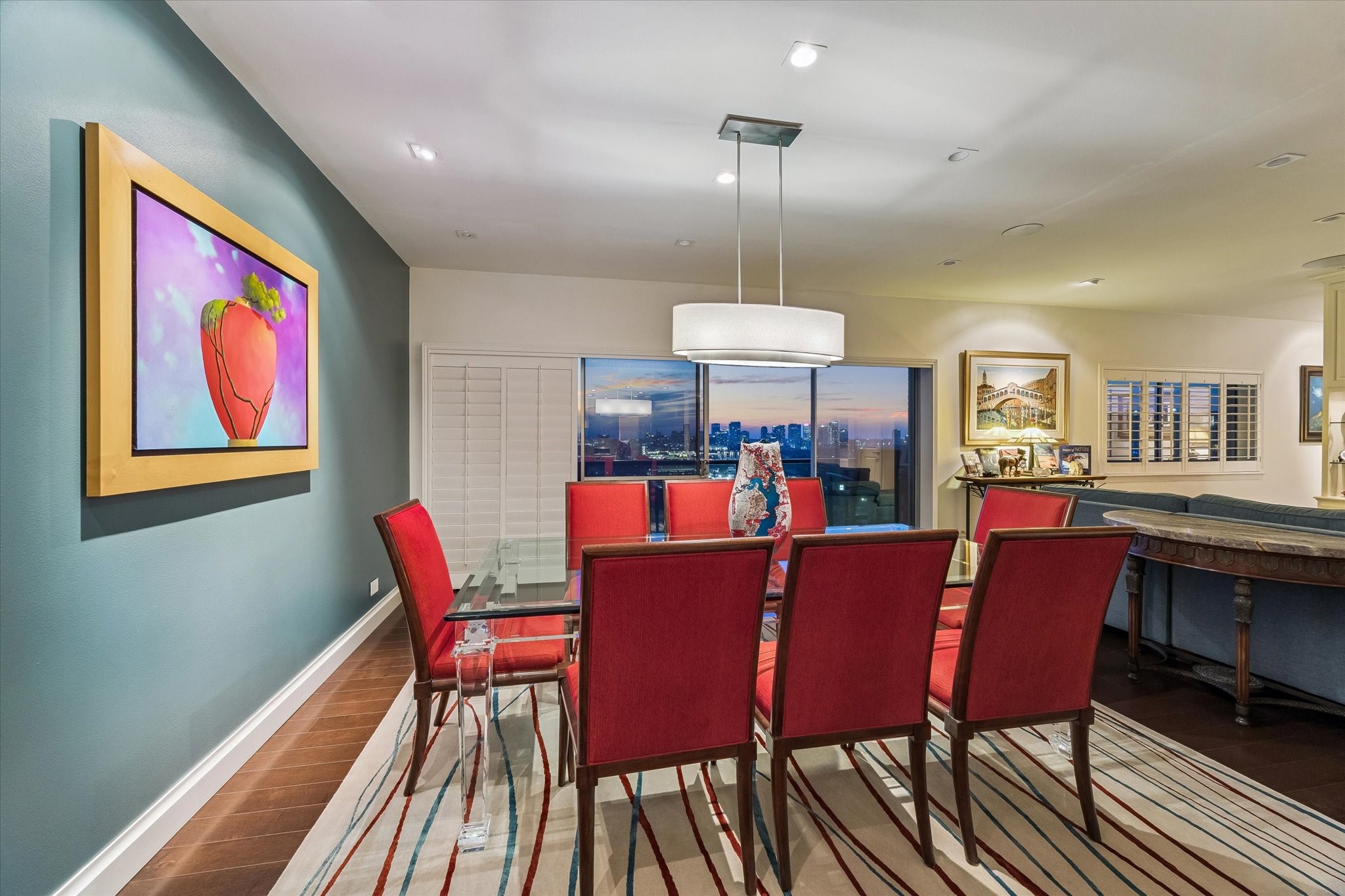 2929 Buffalo Speedway, Unit A1802 Houston, TX 77098 - Photo 31 of 50 a view of a dining room with furniture window and wooden floor