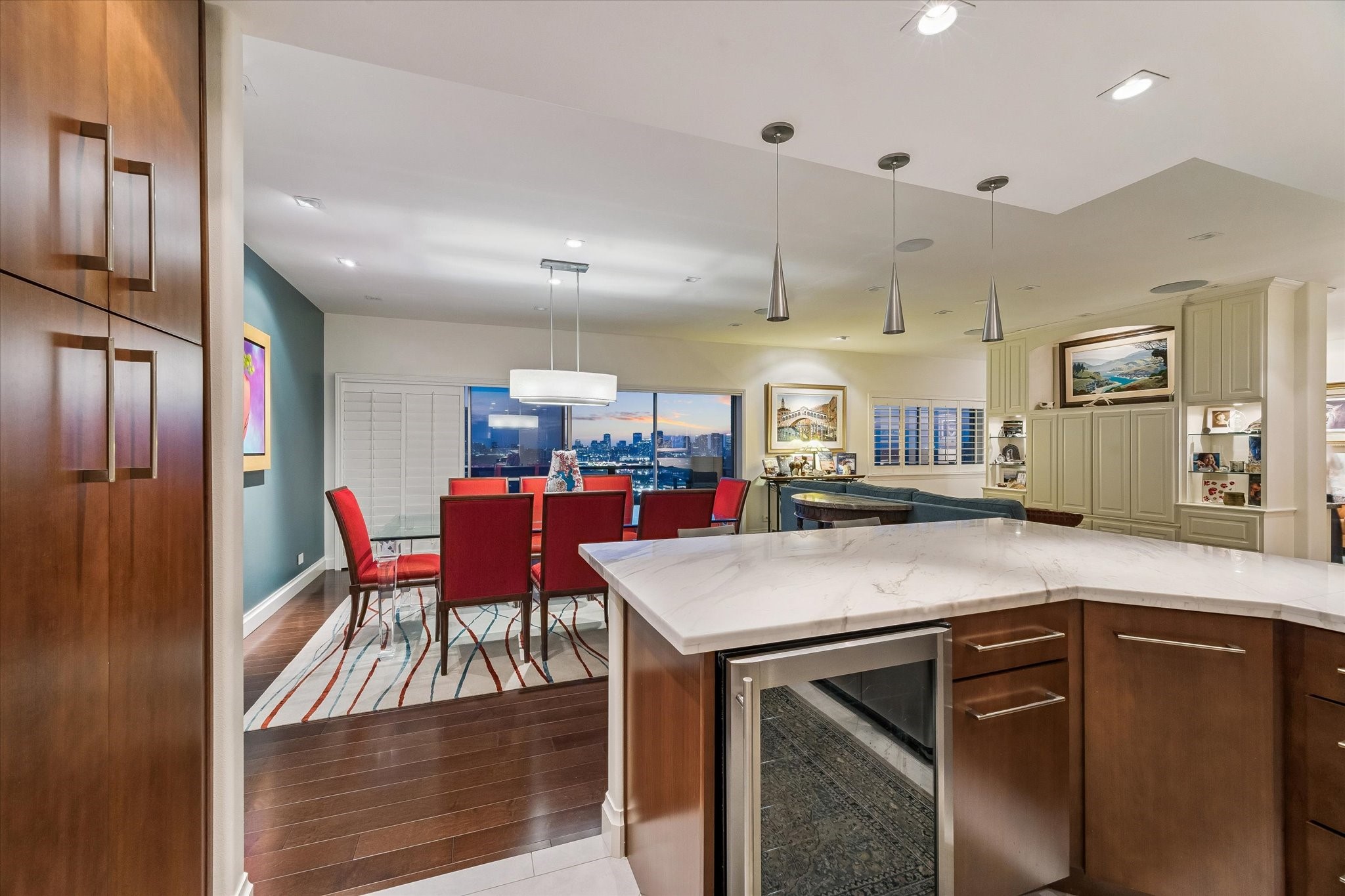 2929 Buffalo Speedway, Unit A1802 Houston, TX 77098 - Photo 32 of 50 a room with stainless steel appliances kitchen island granite countertop a dining table and chairs