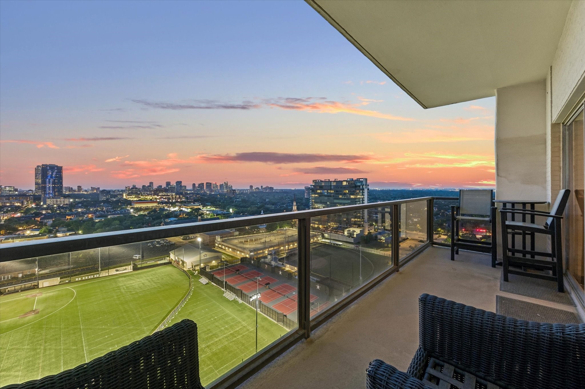 2929 Buffalo Speedway, Unit A1802 Houston, TX 77098 - Photo 36 of 50 a view of a city from a balcony with seating space