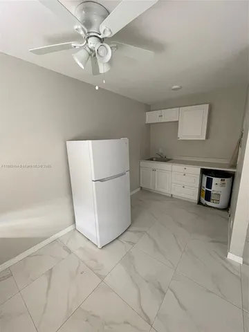 a view of a storage & utility room with washer and dryer