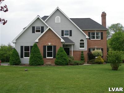680 Clearfield Road Nazareth, PA 18064 - Photo 1 of 30 a front view of a house with a garden