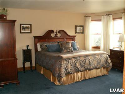 680 Clearfield Road Nazareth, PA 18064 - Photo 12 of 30 a bedroom with a bed and a night stand