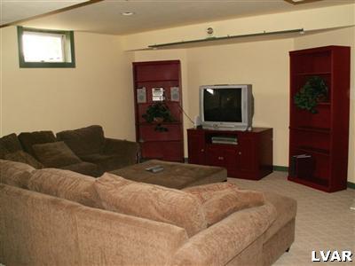 680 Clearfield Road Nazareth, PA 18064 - Photo 17 of 30 a bedroom with a bed and a television in it