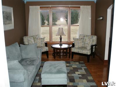 680 Clearfield Road Nazareth, PA 18064 - Photo 8 of 30 a living room with furniture and a table