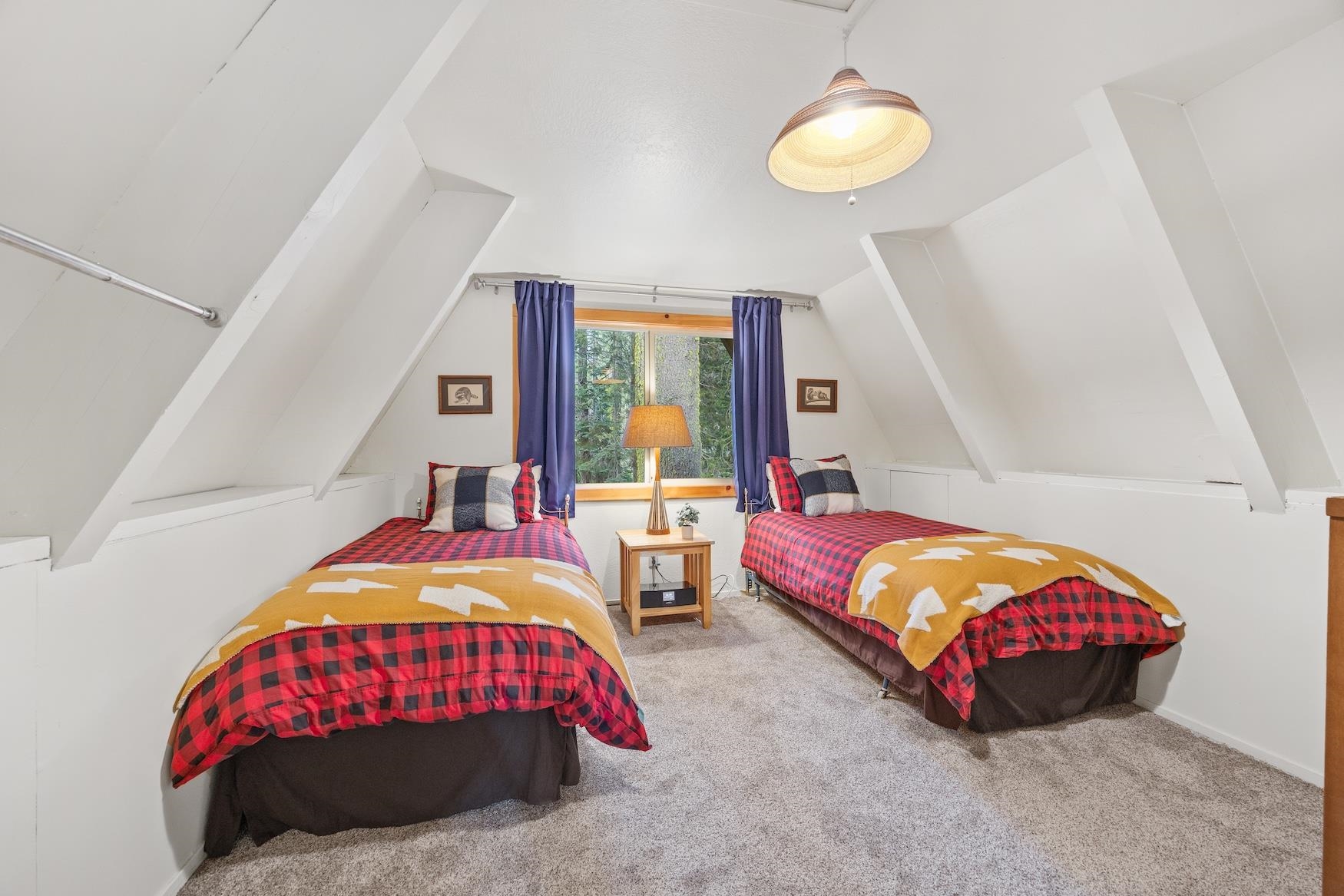 5262 Palisade Road Soda Springs, CA 95728 - Photo 15 of 24 a bedroom with two beds lamp and a potted plant