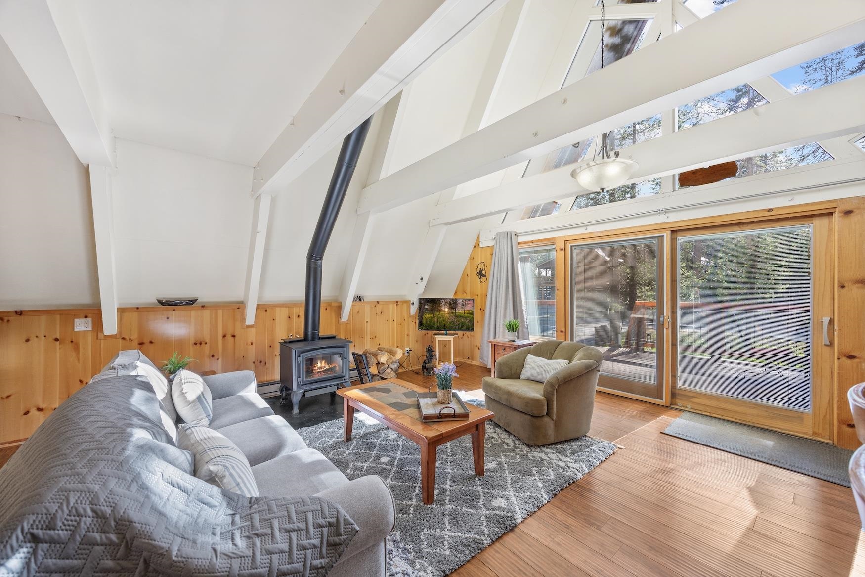 5262 Palisade Road Soda Springs, CA 95728 - Photo 4 of 24 a living room with furniture and large windows