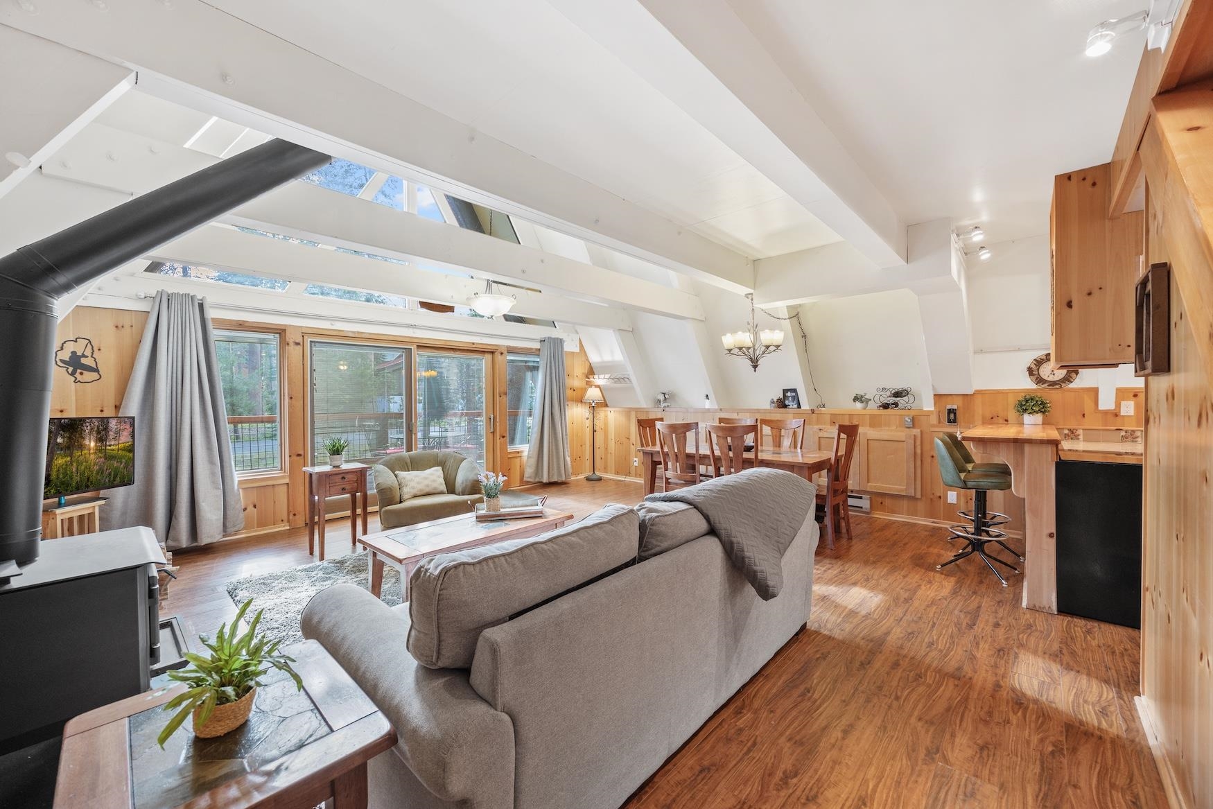 5262 Palisade Road Soda Springs, CA 95728 - Photo 6 of 24 a living room with furniture fireplace and a large window