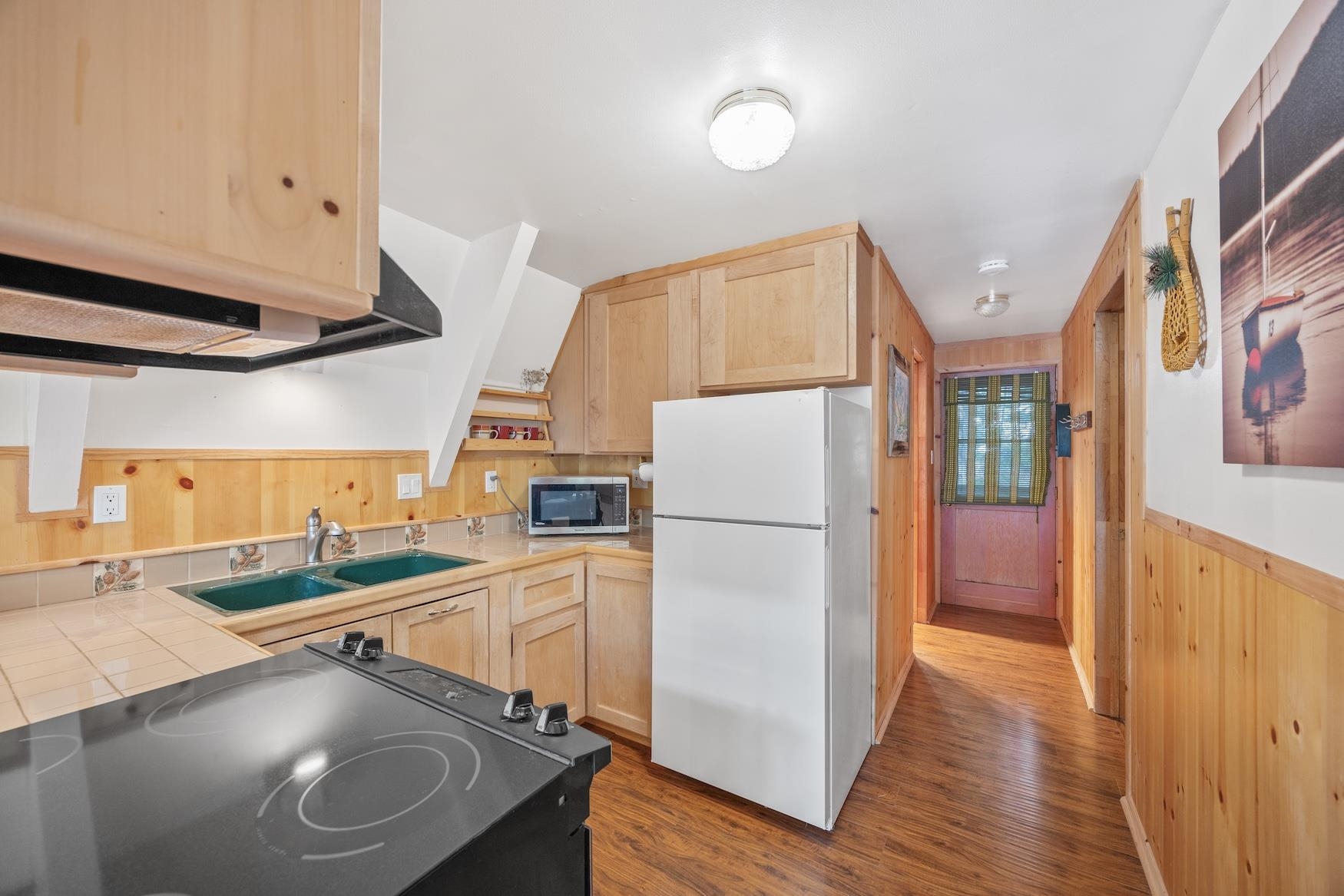 5262 Palisade Road Soda Springs, CA 95728 - Photo 9 of 24 a kitchen with stainless steel appliances a refrigerator and a sink
