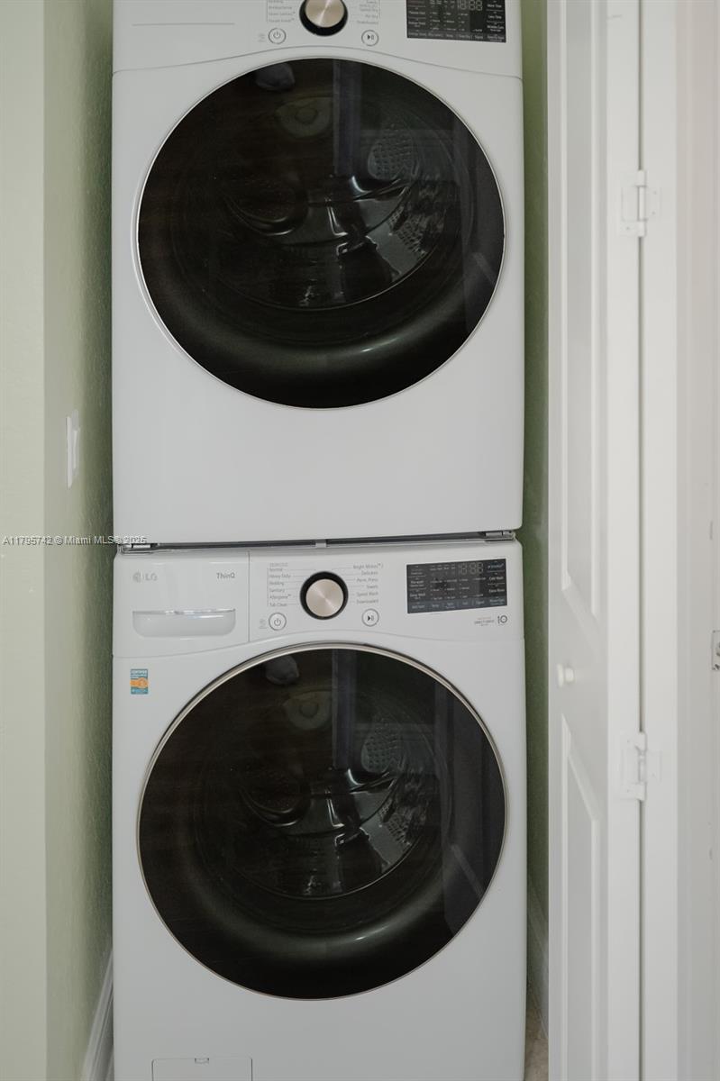 2851 Prospect Road, Unit 1208 Tamarac, FL 33309 - Photo 29 of 34 a close up view of a washer and dryer