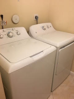 6556 Chasewood Drive, Unit A Jupiter, FL 33458 - Photo 26 of 43 Chasewood Laundry w d 2019