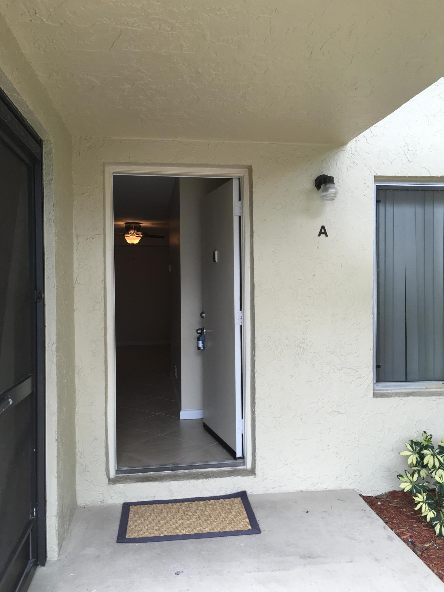 6556 Chasewood Drive, Unit A Jupiter, FL 33458 - Photo 3 of 43 IMG_4583