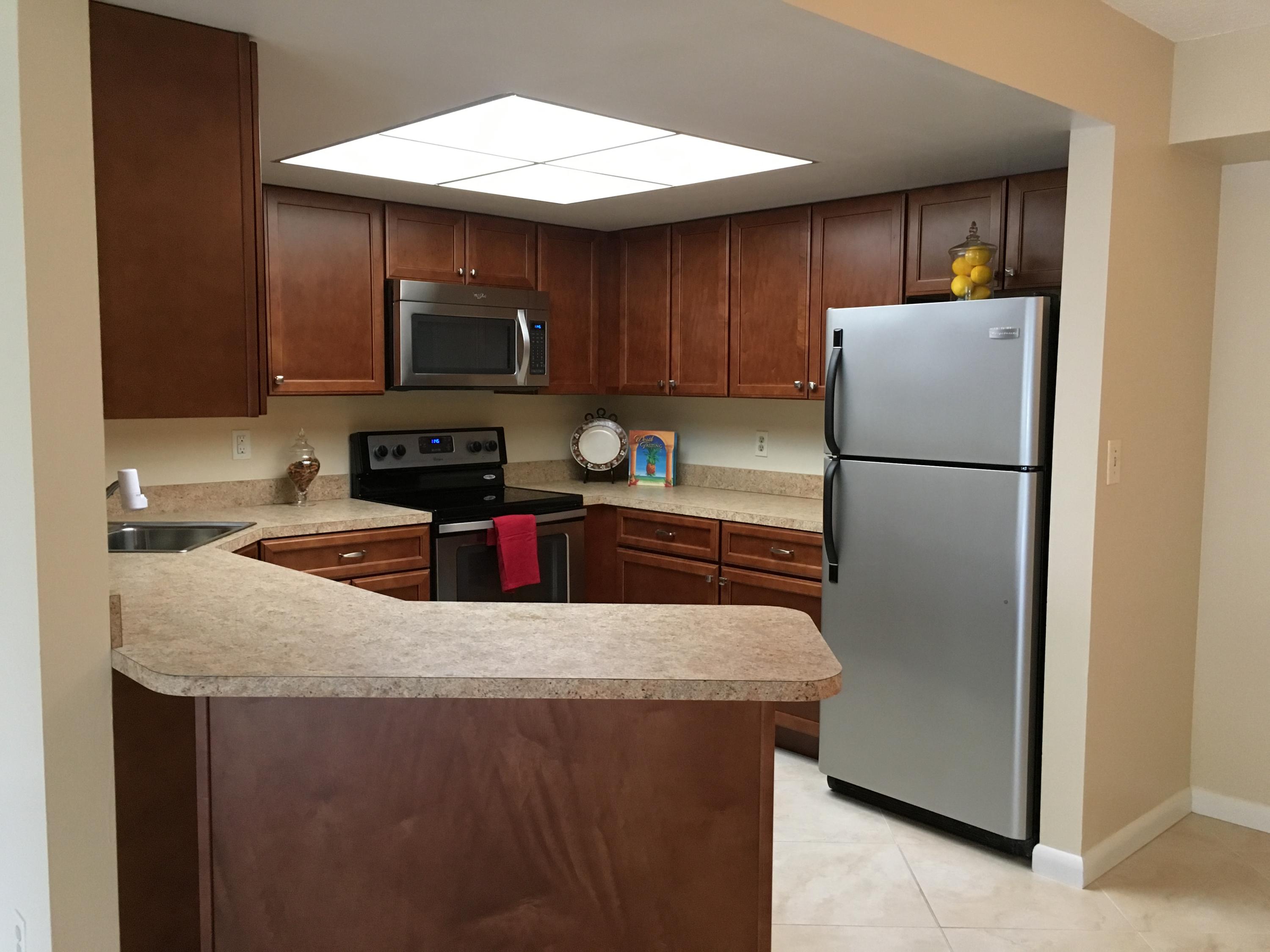 6556 Chasewood Drive, Unit A Jupiter, FL 33458 - Photo 8 of 43 IMG_4603