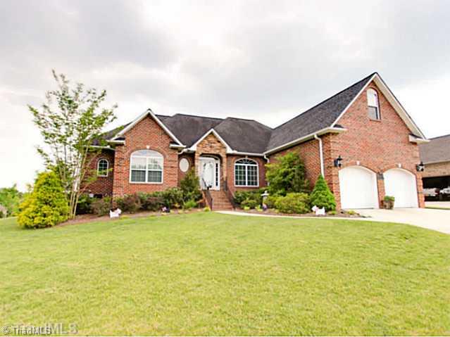 Exterior Front. HUGE CORNER LOT W/ TONS OF PROFESSIONAL LANDSCAPING!!!
