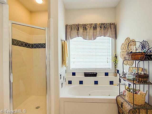 554 Beech Ridge Road Thomasville, NC 27360 - Photo 9 of 16 Master Bath/Spa. Come home from a hard day at work and relax in this jetted tub or separate shower!