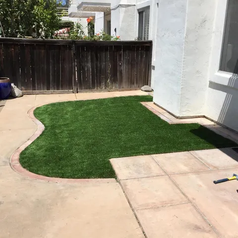 a view of a backyard with a small cabin
