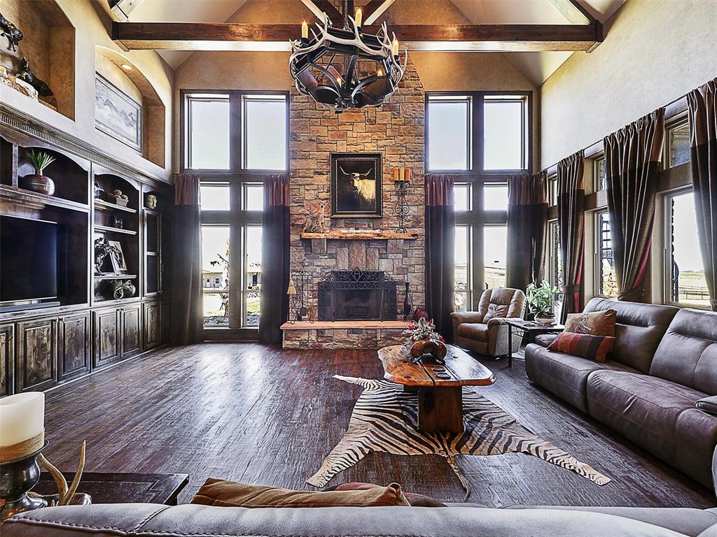 1200 McReynolds Road Sanger, TX 76266 - Photo 19 of 40 a living room with furniture fireplace and flat screen tv