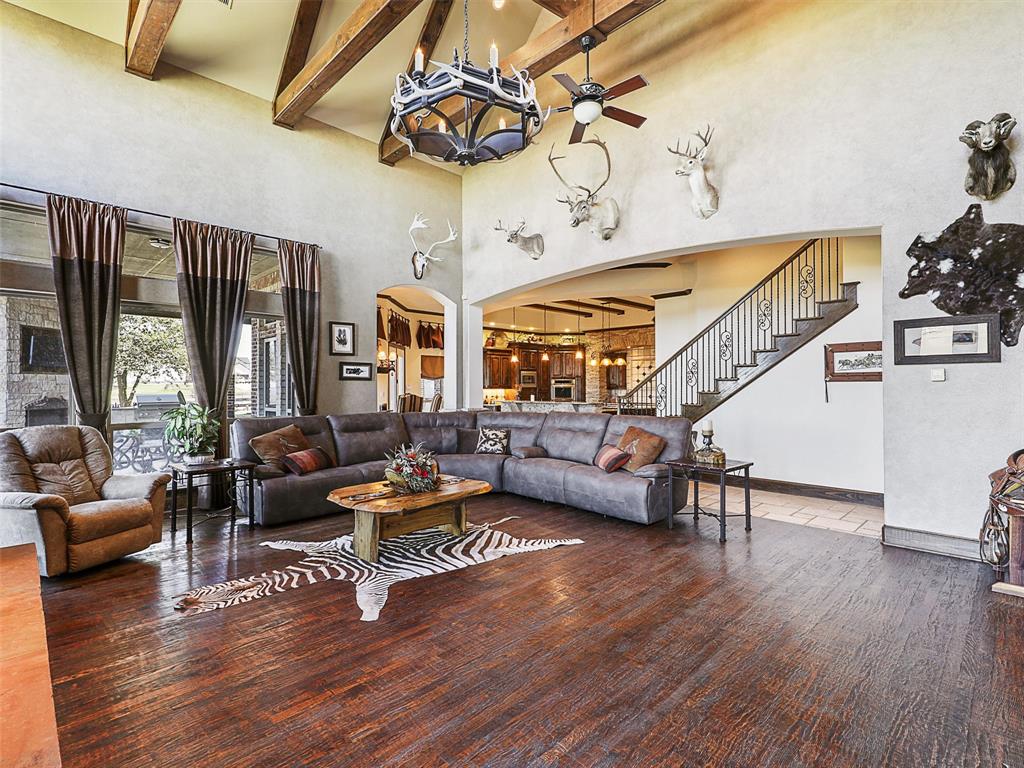 1200 McReynolds Road Sanger, TX 76266 - Photo 20 of 40 a living room with furniture and a wooden floor