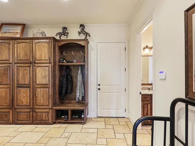 a kitchen that has a sink and a stove in it
