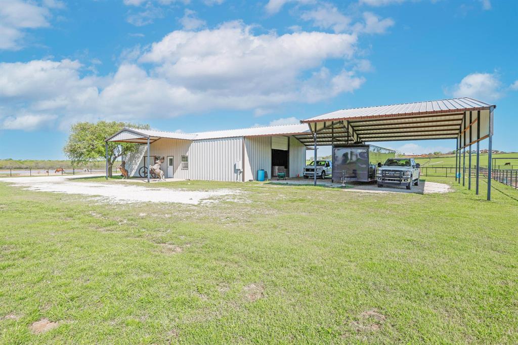 1200 McReynolds Road Sanger, TX 76266 - Photo 38 of 40 a view of swimming pool with outdoor seating
