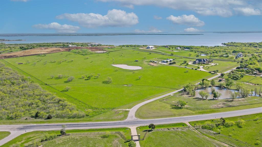 1200 McReynolds Road Sanger, TX 76266 - Photo 40 of 40 a view of a swimming pool with a yard