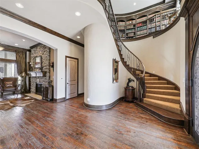a view of an entryway with wooden floor