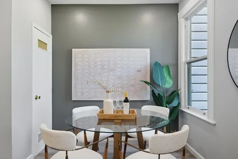 a view of chairs in a balcony