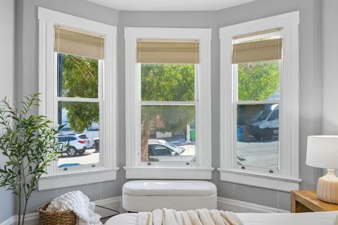 a living room with furniture and a window