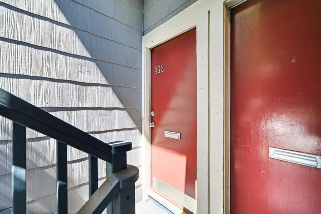 a front view of a house with garage