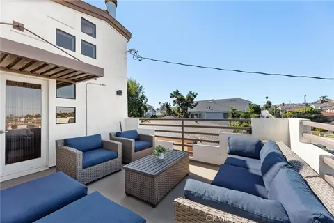 a view of a livingroom with furniture and a couch