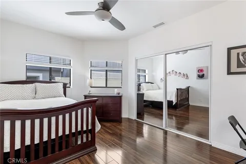 a bedroom with furniture and a window