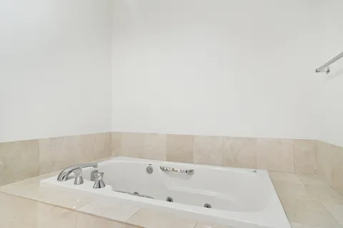 a view of storage and utility room with washer and dryer