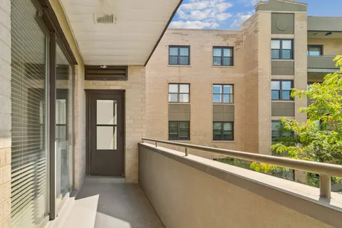 a view of a livingroom with furniture and front door