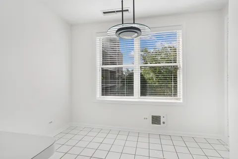 a kitchen with a sink a stove and refrigerator