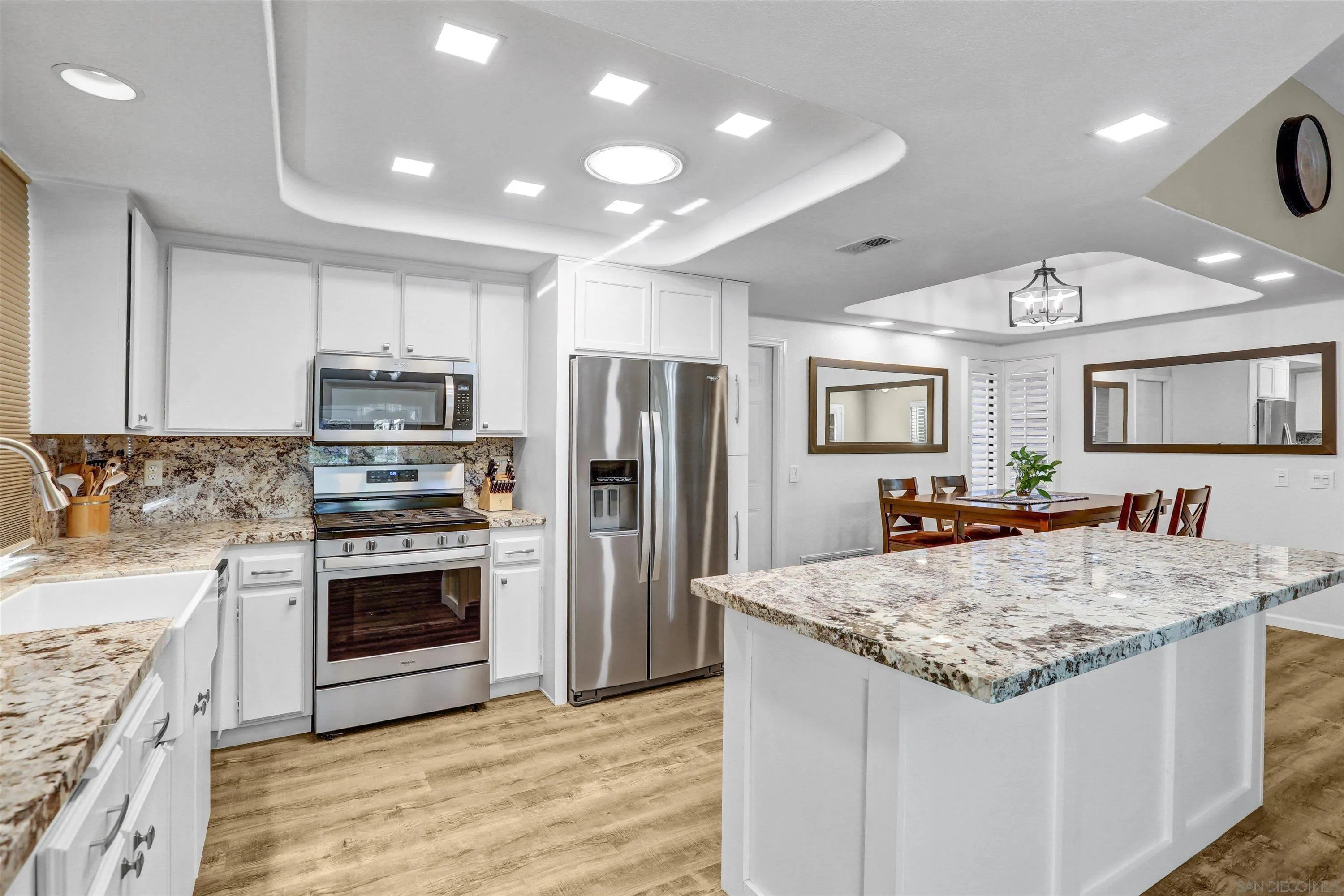 9448 Palomino Ridge Drive Lakeside, CA 92040 - Photo 12 of 35 a kitchen with stainless steel appliances granite countertop a stove and a sink