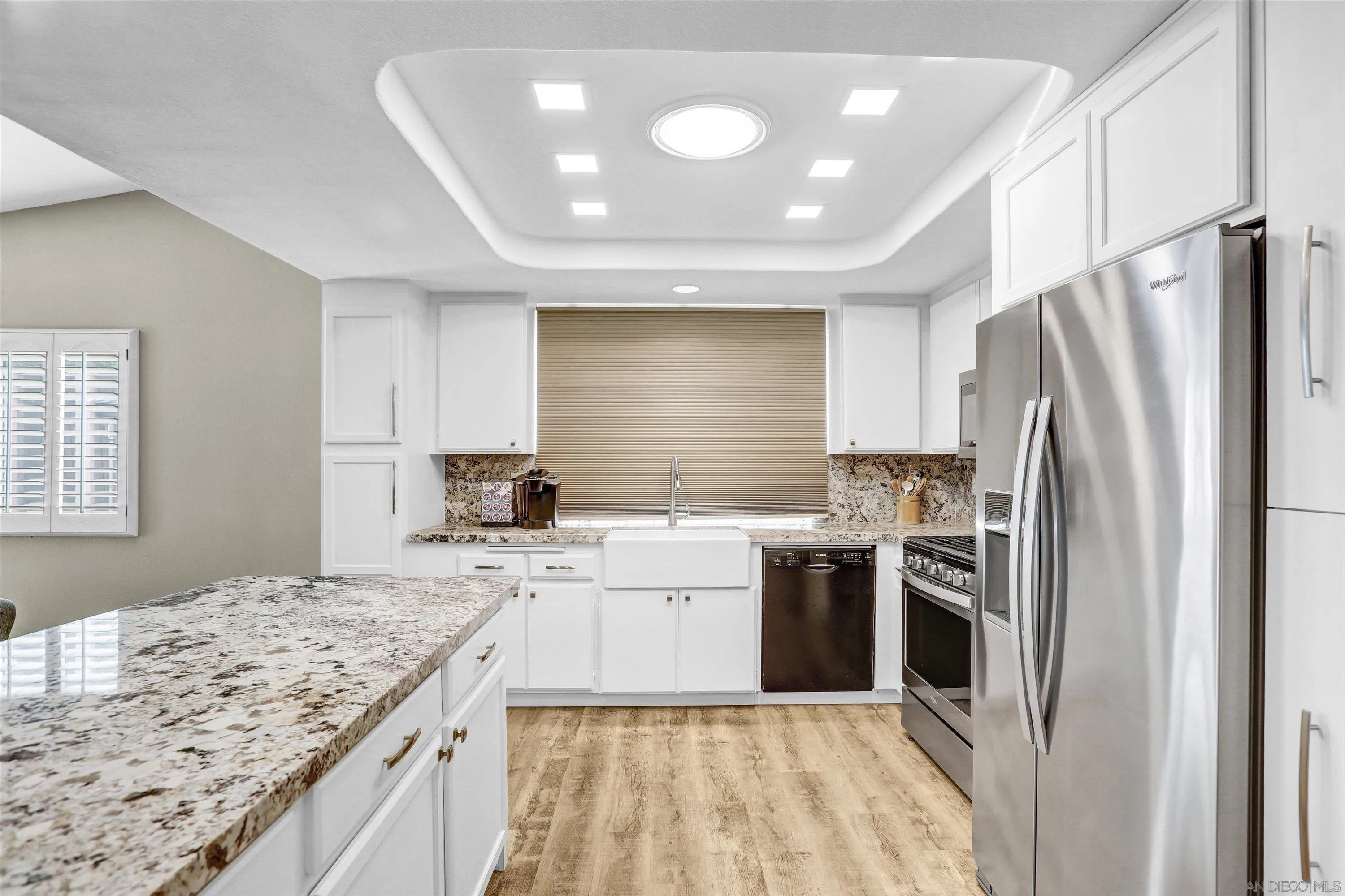 9448 Palomino Ridge Drive Lakeside, CA 92040 - Photo 14 of 35 a kitchen with a sink stove and refrigerator