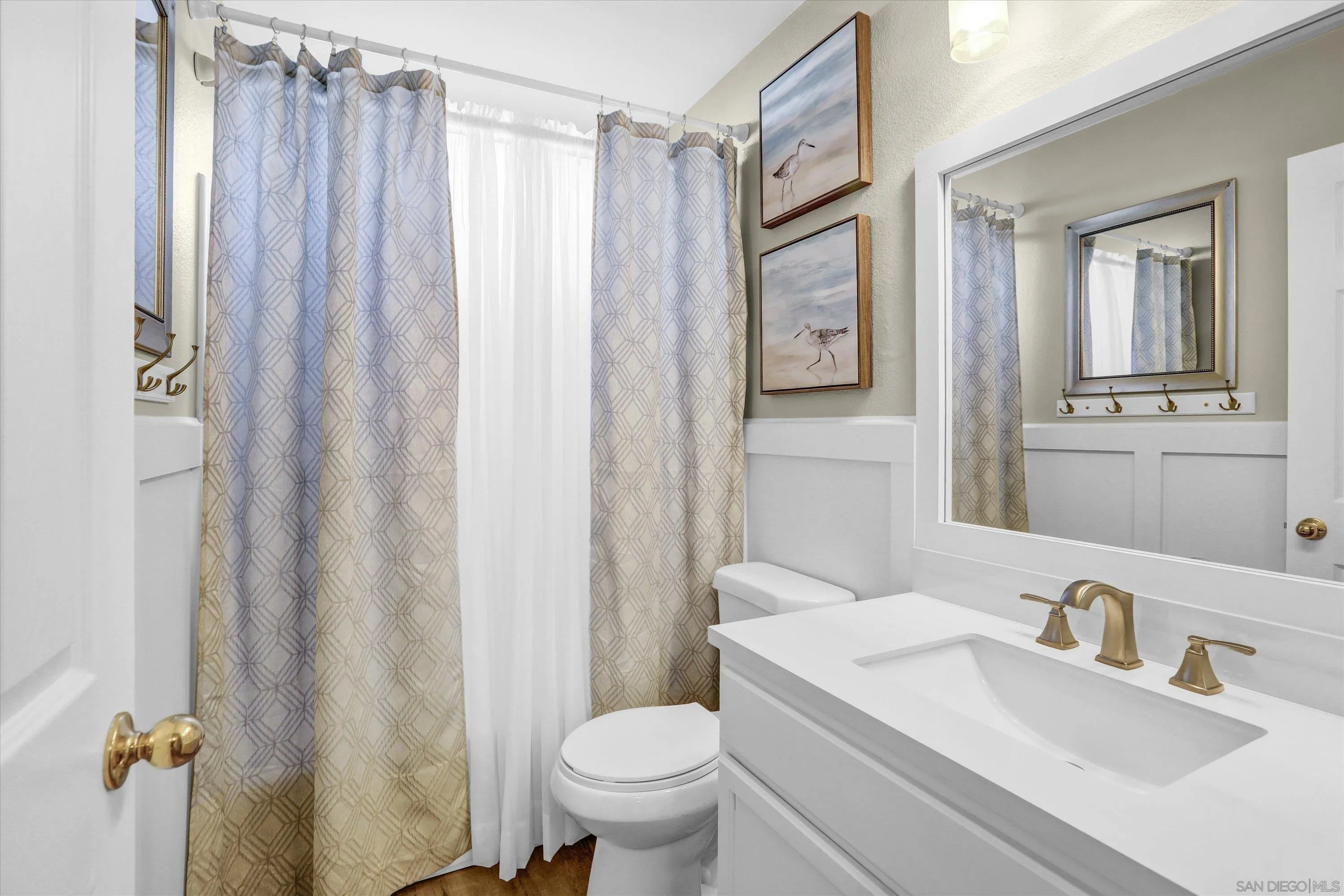 9448 Palomino Ridge Drive Lakeside, CA 92040 - Photo 18 of 35 a bathroom with a granite countertop sink toilet and mirror