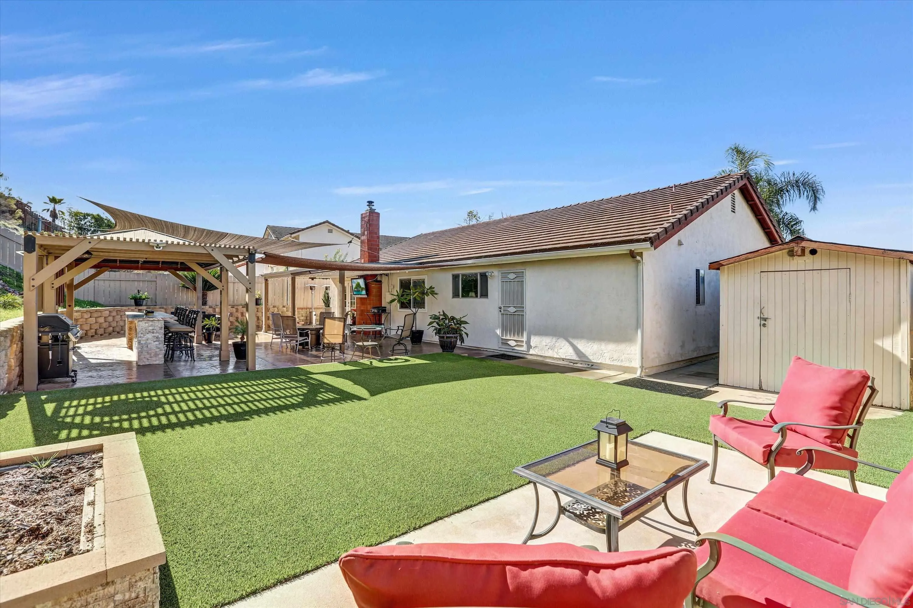 9448 Palomino Ridge Drive Lakeside, CA 92040 - Photo 24 of 35 a front view of a house with garden