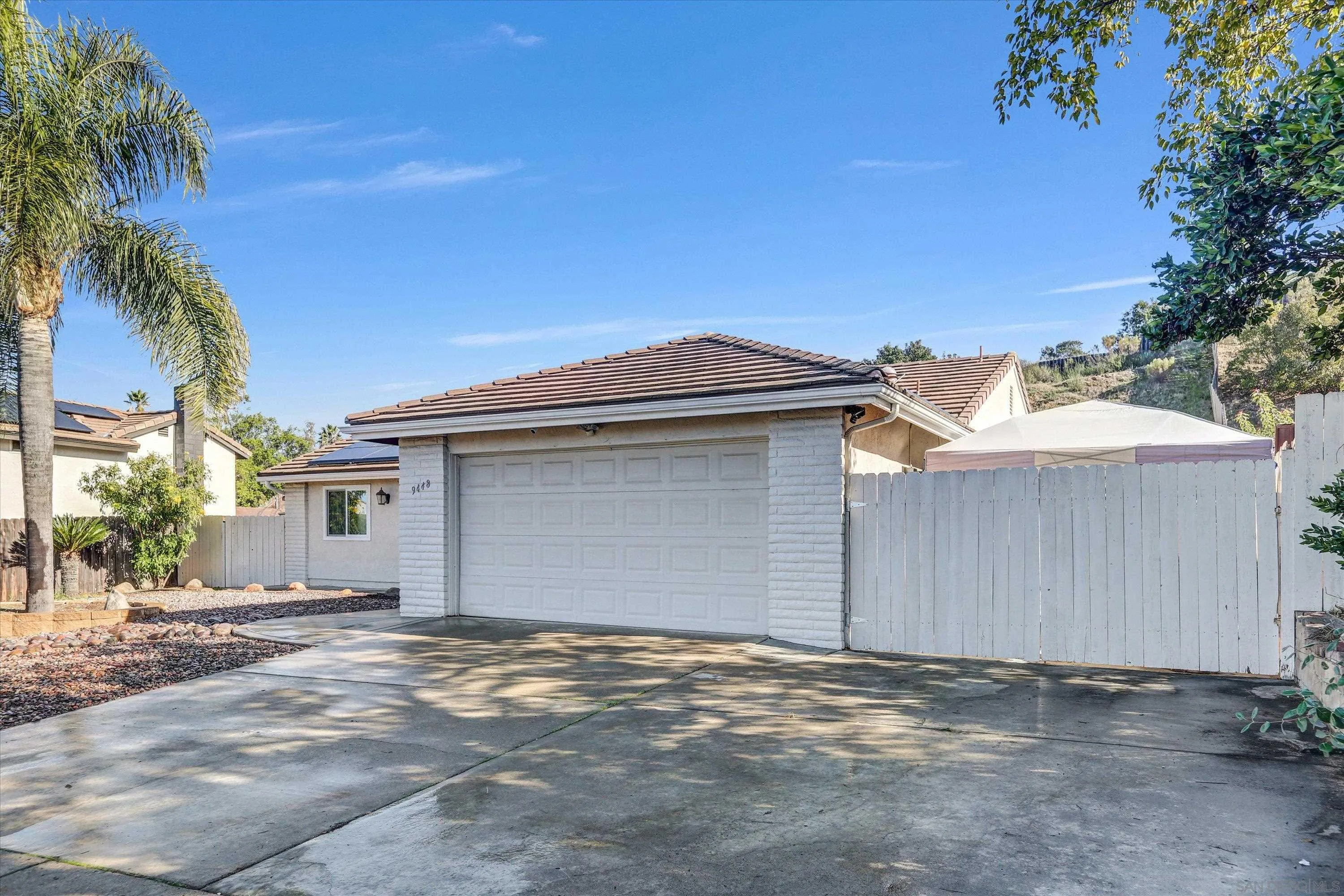 9448 Palomino Ridge Drive Lakeside, CA 92040 - Photo 3 of 35 a view of a backyard of a house