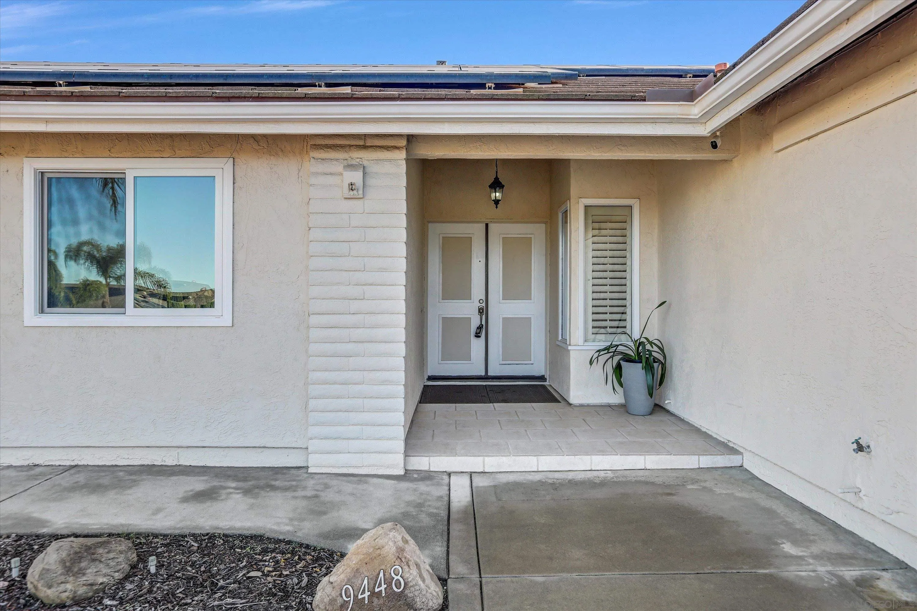 9448 Palomino Ridge Drive Lakeside, CA 92040 - Photo 4 of 35 a view of a door and chair in a room