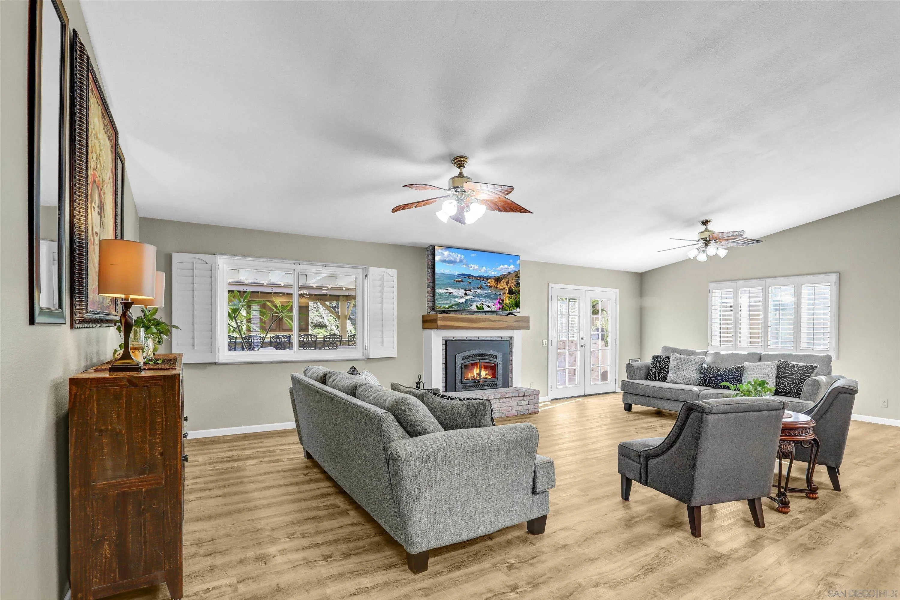 9448 Palomino Ridge Drive Lakeside, CA 92040 - Photo 5 of 35 a living room with furniture and a fireplace
