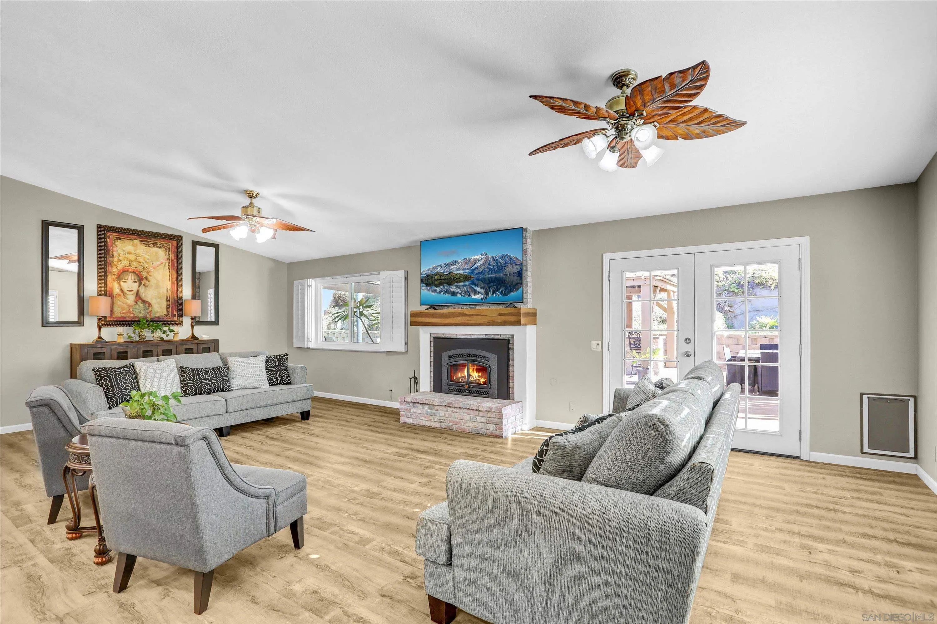 9448 Palomino Ridge Drive Lakeside, CA 92040 - Photo 6 of 35 a living room with furniture a fireplace and a large window