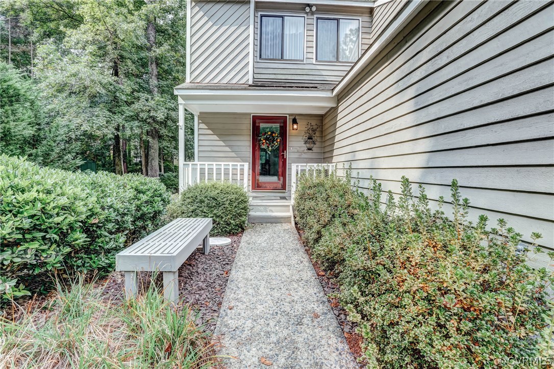 14117 Ridge Creek Road Midlothian, VA 23112 - Photo 2 of 24 a view of a pathway with a house