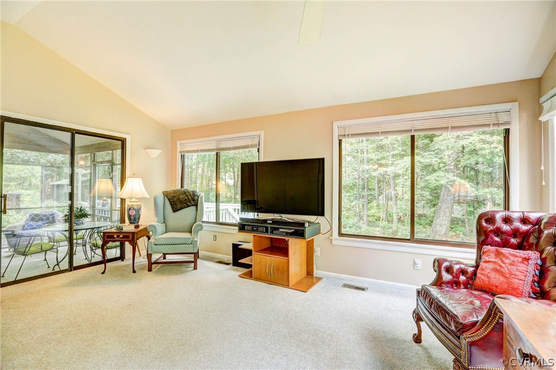 14117 Ridge Creek Road Midlothian, VA 23112 - Photo 10 of 24 a living room with furniture and a flat screen tv