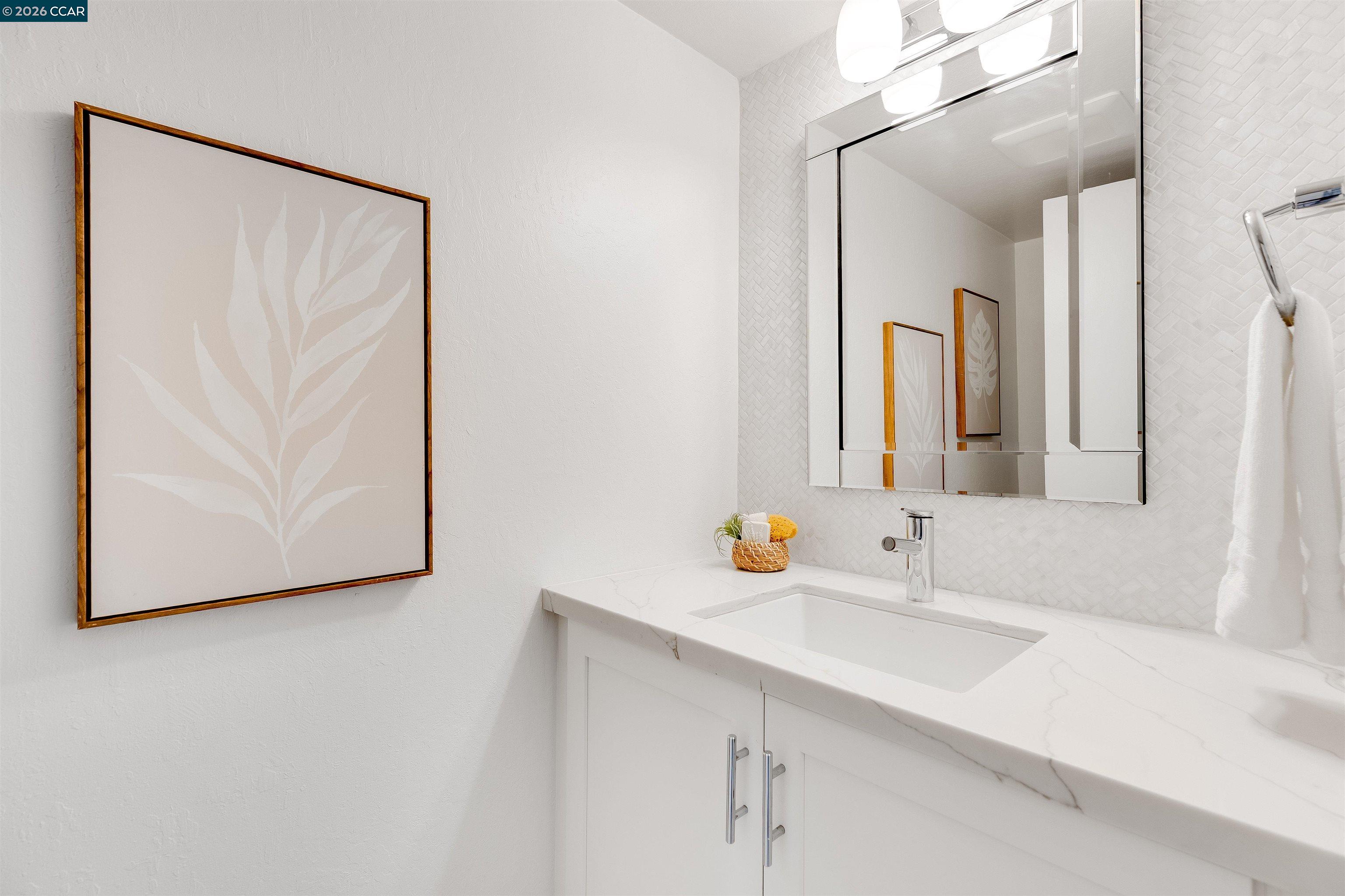 418 Devon Court San Ramon, CA 94583 - Photo 21 of 62 a bathroom with a sink and a mirror
