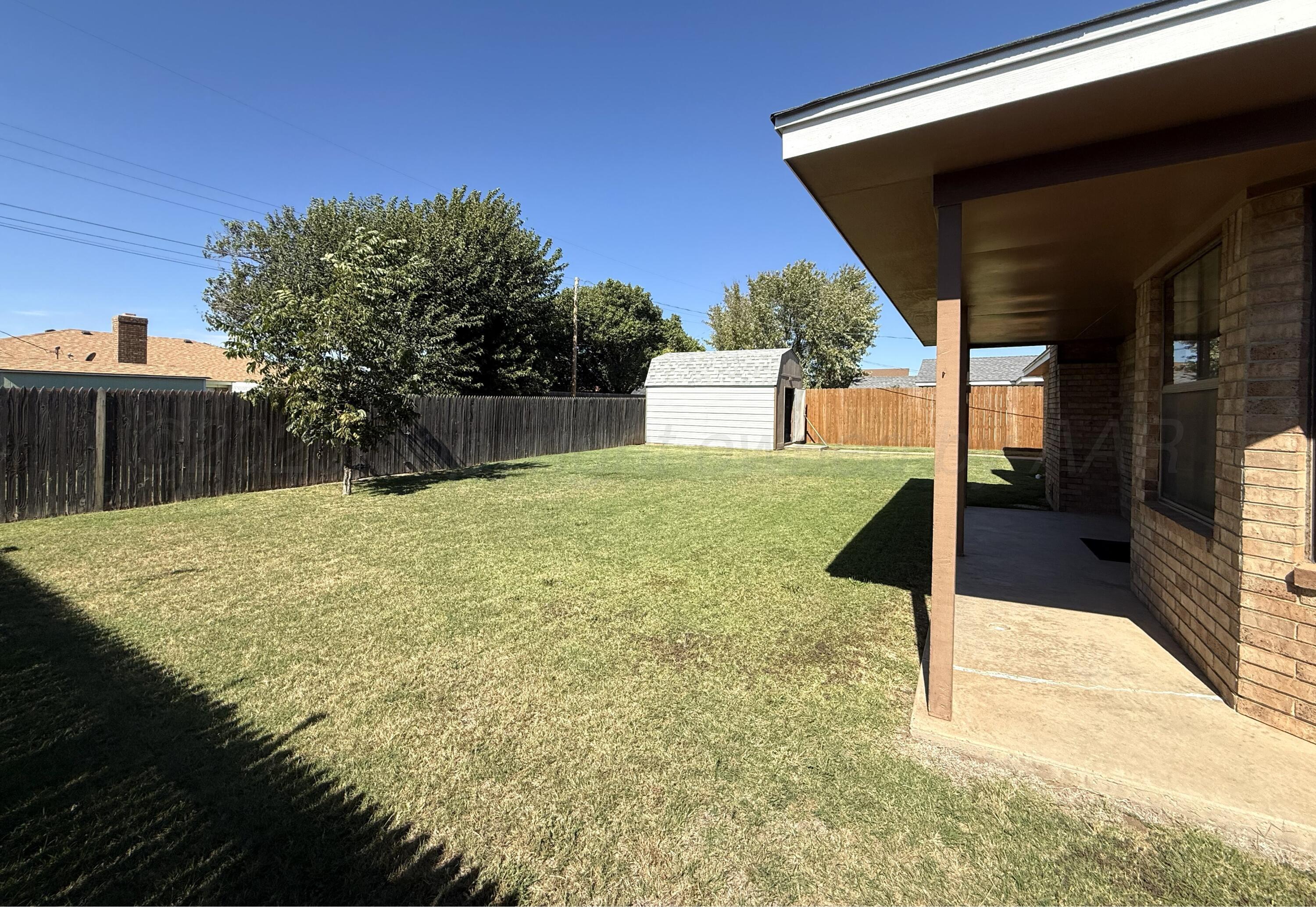 1525 North Nelson Street Pampa, TX 79065 - Photo 15 of 15 a view of a backyard