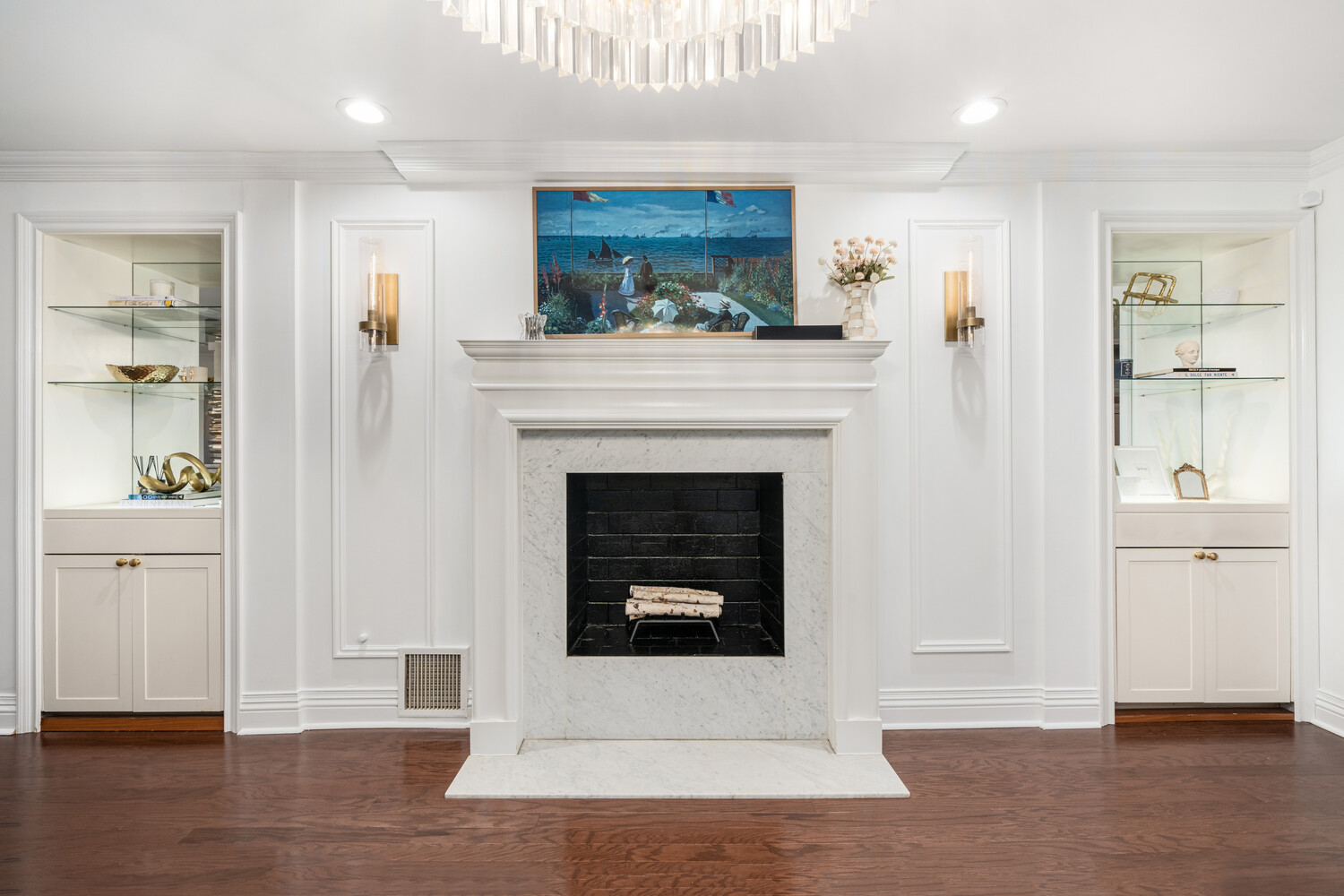 40 East 74th Street, Unit 1 Manhattan, NY 10021 - Photo 2 of 11 a living room with furniture and a fireplace