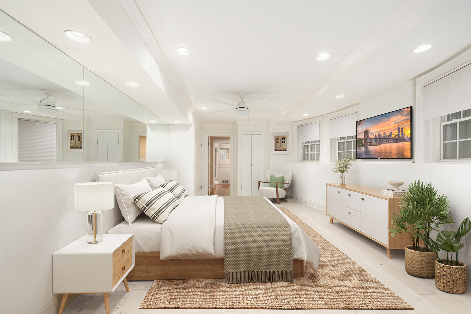 40 East 74th Street, Unit 1 Manhattan, NY 10021 - Photo 7 of 11 a large room with a lot of white furniture