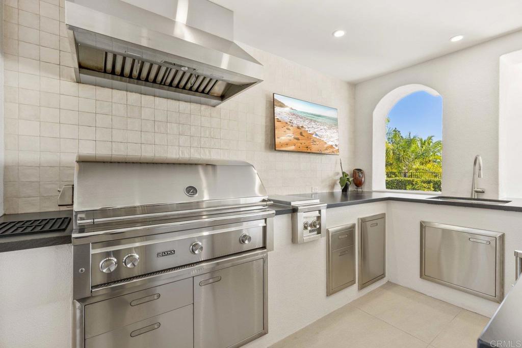 3226 Violet Ridge Encinitas, CA 92024 - Photo 31 of 54 a kitchen with appliances cabinets and a window