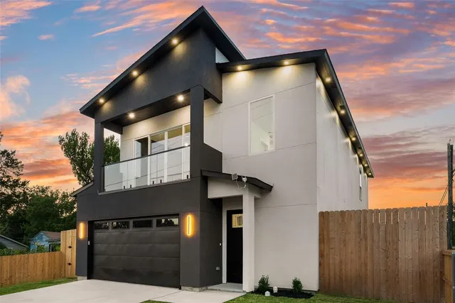 a view of a house with a garage