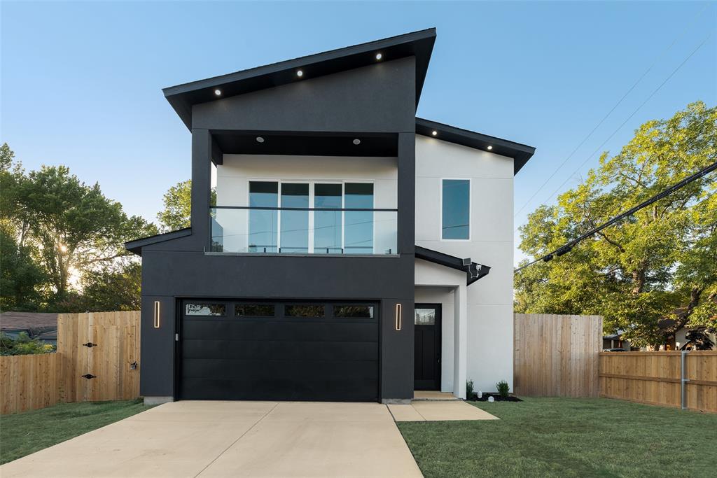 1651 East Overton Road Dallas, TX 75216 - Photo 3 of 21 a front view of a house with a garden